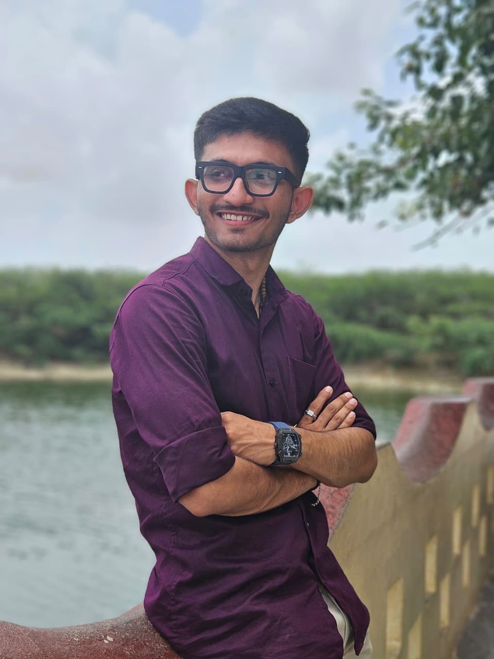 Manav Joshi outdoors by the water